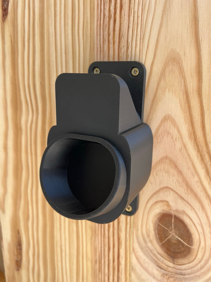 Close up of black Type 2 IEC 62196 charging connector receptacle for wall