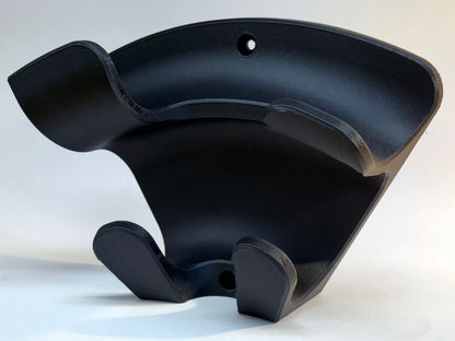 Black universal 3D printed EV charging plug and cable wall holder by itself